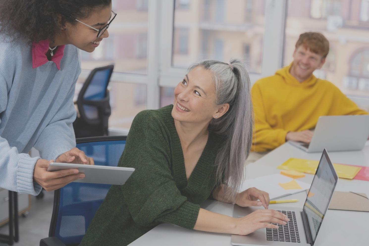 Financial analyst presenting data insights to a business team in a modern conference room